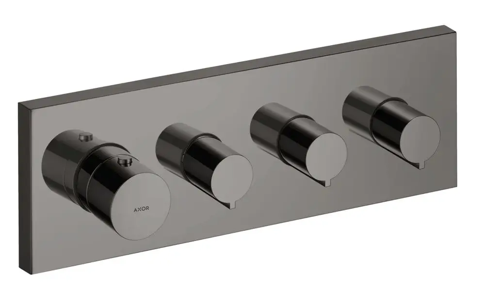 Thermostatmodul mit drei drehbaren Reglern in glänzend schwarzem Chrom, montiert auf einer rechteckigen Platte. Markierung "AXOR" sichtbar.